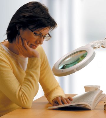 Daylight U25080 LED UltraSlim Magnifying Lamp XR In Use Female Reading Image
